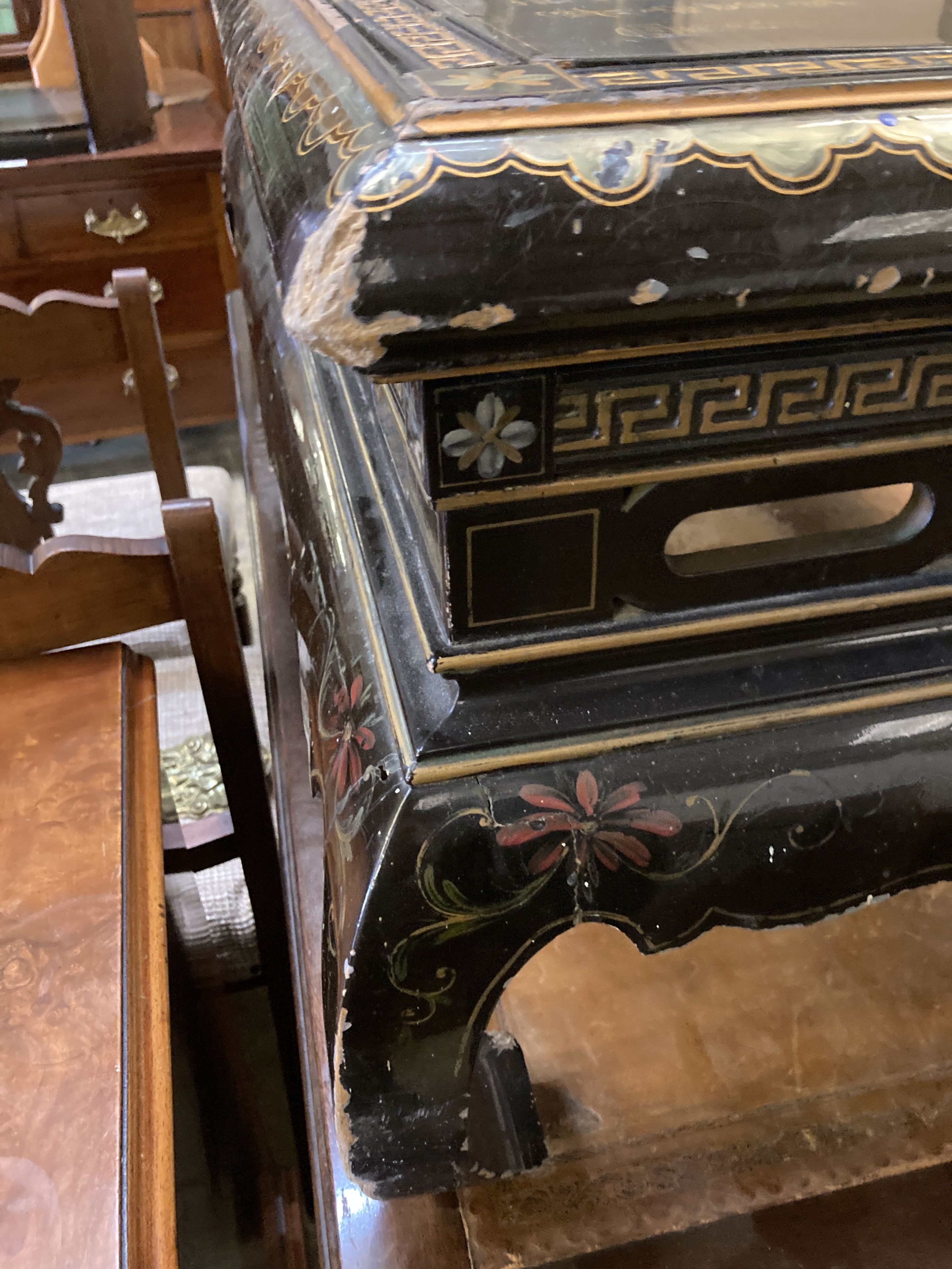 A rectangular Chinese lacquer coffee table, length 128cm, depth 69cm, height 44cm